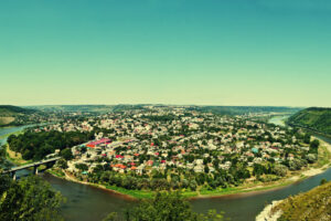Panorama view of small city round peninsula with river and bridg Panorama view of small city round peninsula with river and bridg